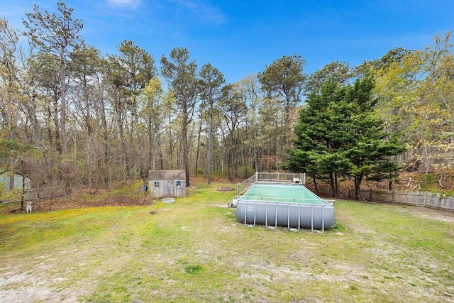 239 Upper County Rd, Dennis, MA 02660 - view of yard featuring a storage unit and an outbuilding