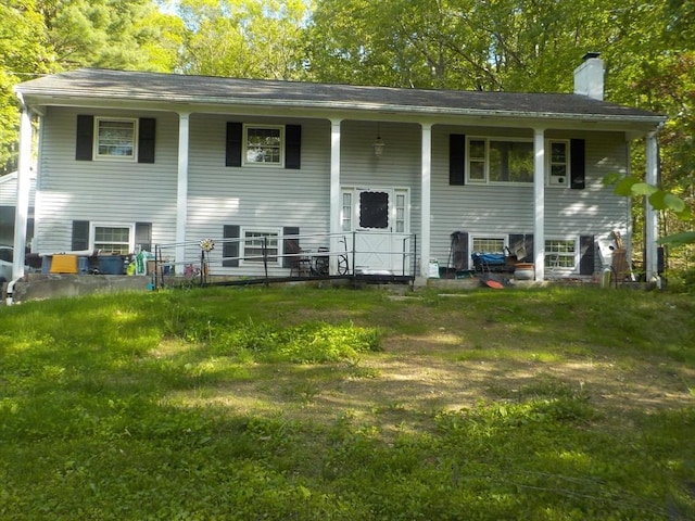 545 Douglas Rd, Northbridge, MA 01588 - back of house featuring a chimney and covered porch