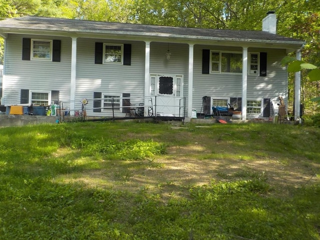 545 Douglas Rd, Northbridge, MA 01588 - back of property featuring a chimney and covered porch