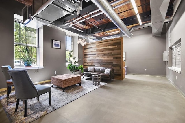 interior space featuring baseboards and concrete floors