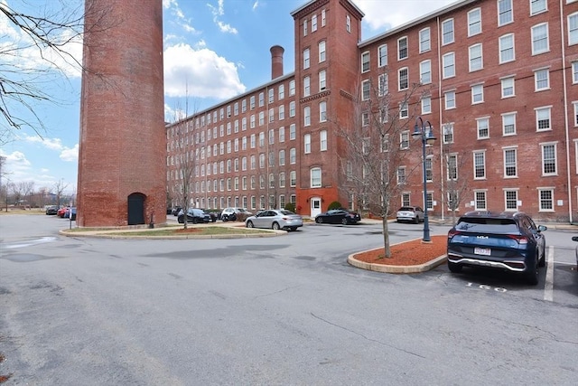 view of property with uncovered parking