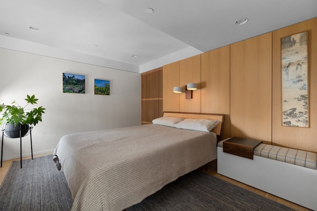 bedroom featuring dark wood-type flooring