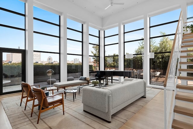 sunroom / solarium with ceiling fan