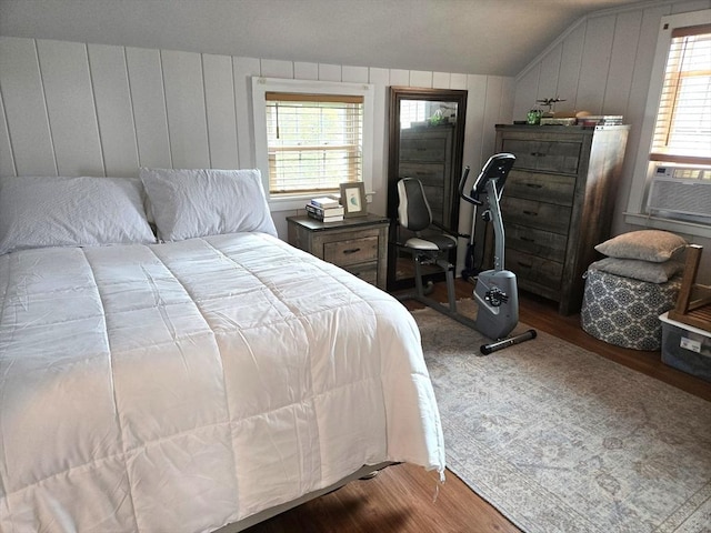 230 Gosnold St Unit 1A, Barnstable, MA 02601 - bedroom featuring wood finished floors, vaulted ceiling, and cooling unit