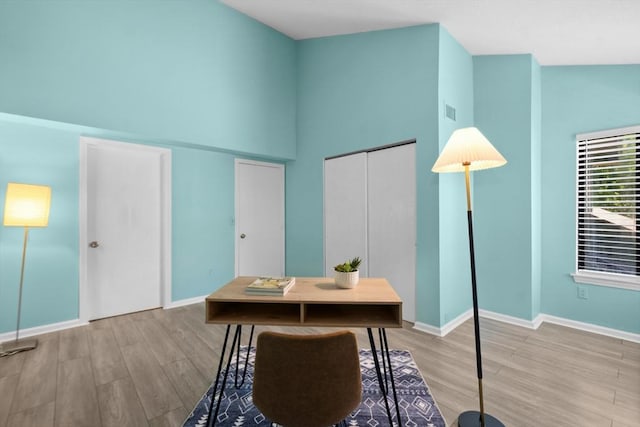 243 Trailside Way Unit 243, Ashland, MA 01721 - home office featuring high vaulted ceiling, wood finished floors, and baseboards
