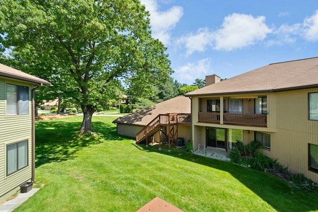 243 Trailside Way Unit 243, Ashland, MA 01721 - view of green lawn with central AC unit and stairway