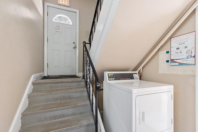 laundry room with washer / dryer