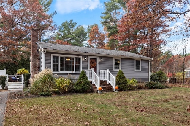 view of front of home with a front yard