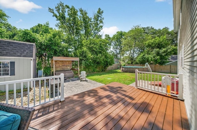 29 Edgemere Dr, Seekonk, MA 02771 - wooden deck with a covered hot tub, a fenced backyard, a patio area, and a storage shed