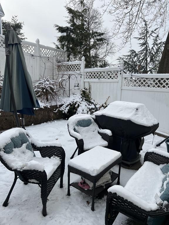 view of snow covered patio