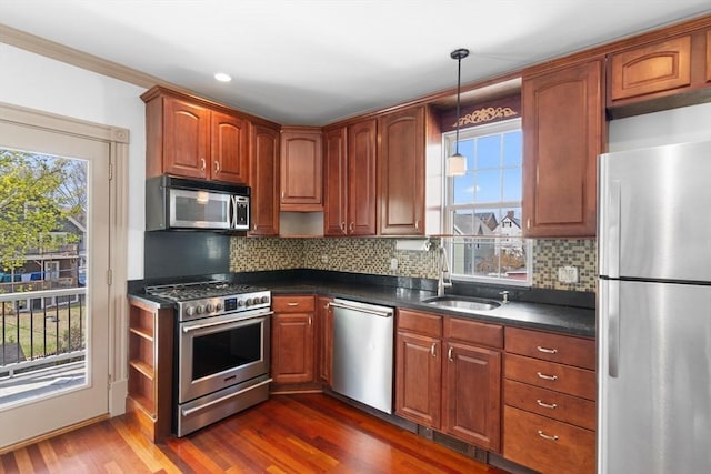 13 Maryland St Unit 2, Boston, MA 02125 - kitchen featuring dark wood-style floors, open shelves, dark countertops, a sink, and appliances with stainless steel finishes