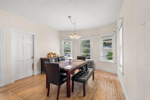 426 Moraine St, Brockton, MA 02301 - dining area with a chandelier and light wood-style flooring