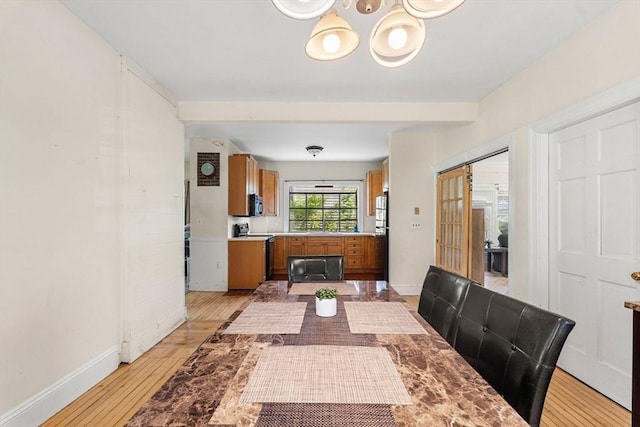 426 Moraine St, Brockton, MA 02301 - dining room featuring light wood-style floors and a chandelier