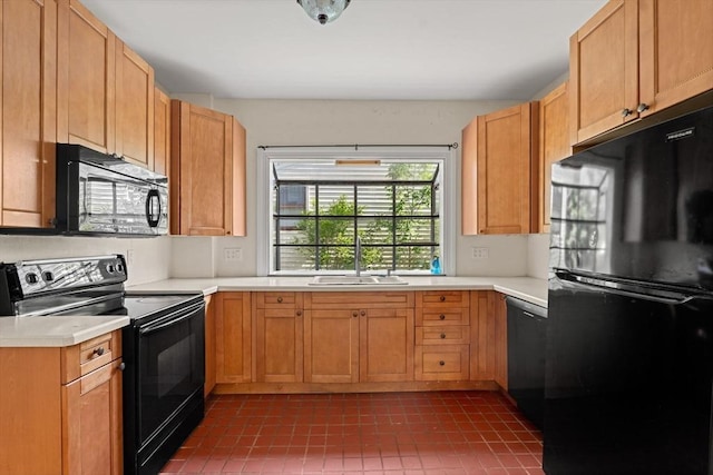 426 Moraine St, Brockton, MA 02301 - kitchen with black appliances, light countertops, and dark tile patterned floors