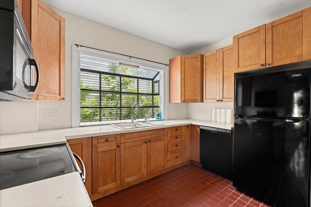 426 Moraine St, Brockton, MA 02301 - kitchen with black appliances, light countertops, and dark tile patterned flooring