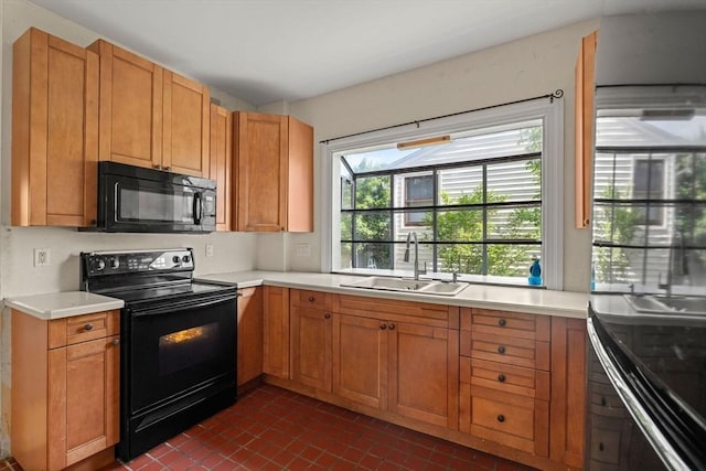 426 Moraine St, Brockton, MA 02301 - kitchen featuring black appliances, light countertops, and dark tile patterned floors