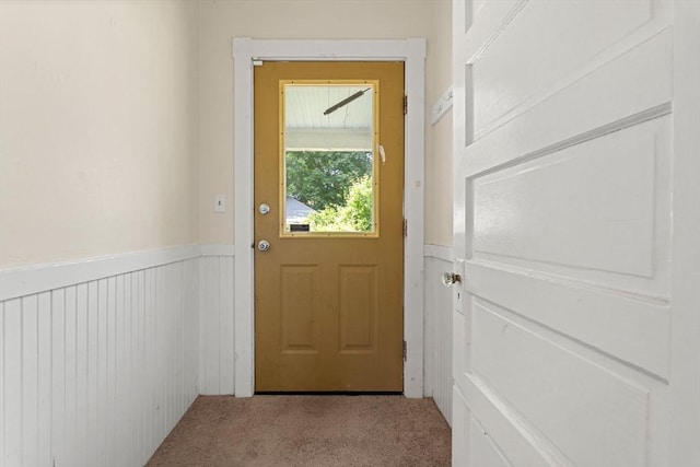 426 Moraine St, Brockton, MA 02301 - doorway to outside featuring a wainscoted wall and carpet