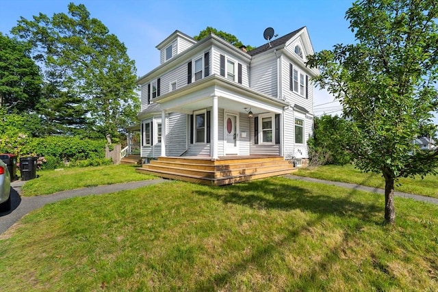426 Moraine St, Brockton, MA 02301 - american foursquare style home with a porch and a front lawn