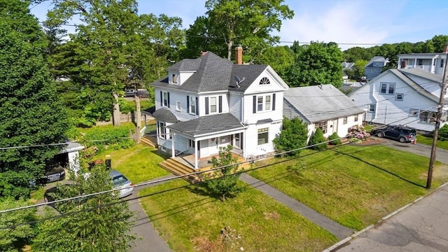 426 Moraine St, Brockton, MA 02301 - view of front of home with a shingled roof and a chimney