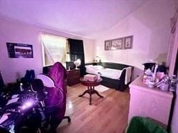 bedroom with wood finished floors