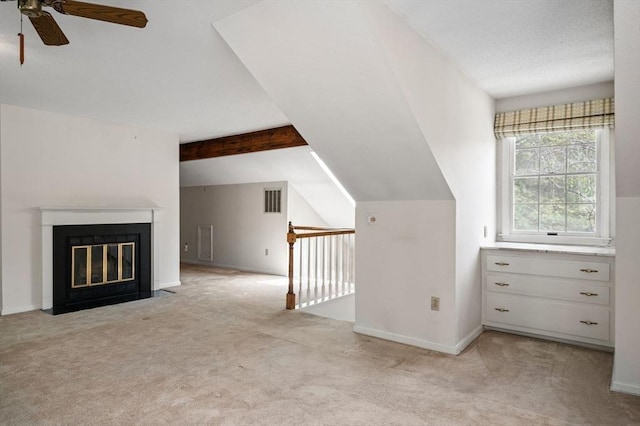 27 Fuller Pond Rd Unit 27, Middleton, MA 01949 - additional living space with a ceiling fan, light colored carpet, baseboards, and a fireplace with flush hearth