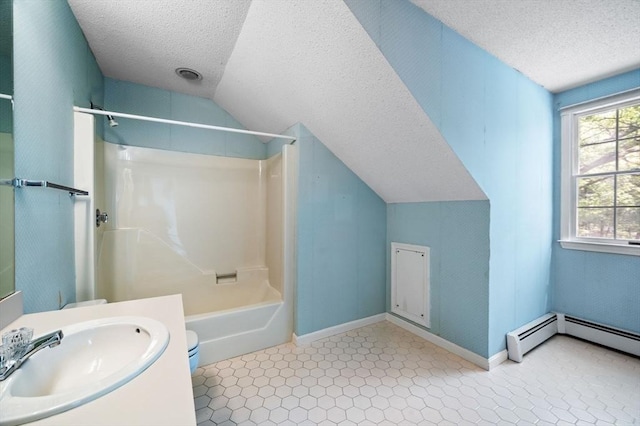 27 Fuller Pond Rd Unit 27, Middleton, MA 01949 - full bath with a textured ceiling, lofted ceiling, vanity, shower / washtub combination, and baseboards