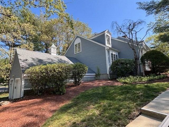 27 Fuller Pond Rd Unit 27, Middleton, MA 01949 - view of side of home with a yard