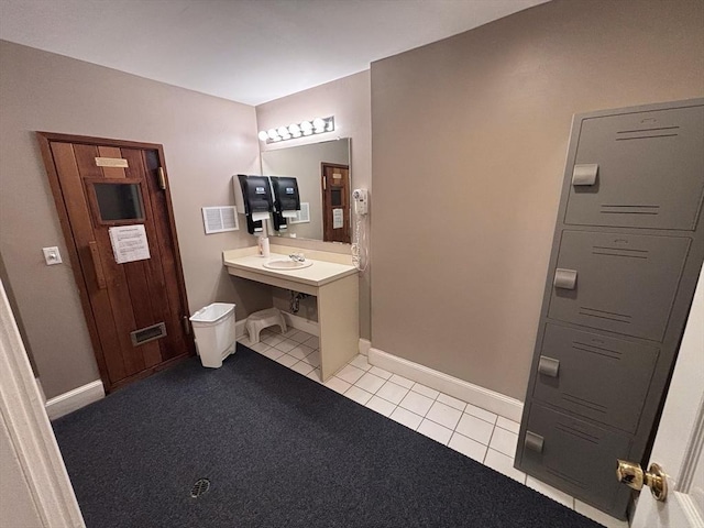 27 Fuller Pond Rd Unit 27, Middleton, MA 01949 - bathroom with tile patterned flooring, a sink, and baseboards