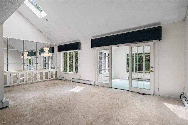 27 Fuller Pond Rd Unit 27, Middleton, MA 01949 - carpeted spare room with a baseboard heating unit, a skylight, high vaulted ceiling, a baseboard radiator, and a chandelier