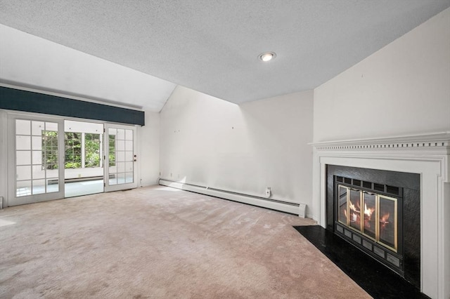 27 Fuller Pond Rd Unit 27, Middleton, MA 01949 - unfurnished living room with a baseboard heating unit, carpet floors, vaulted ceiling, a fireplace with flush hearth, and a textured ceiling