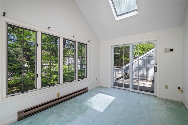 27 Fuller Pond Rd Unit 27, Middleton, MA 01949 - carpeted spare room with a baseboard heating unit, baseboards, vaulted ceiling, and a skylight