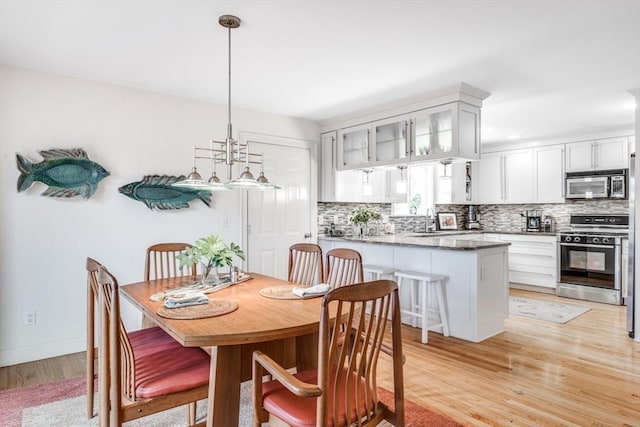 39 Fairway Pointe Rd Unit 39, Falmouth, MA 02536 - dining area featuring light wood-type flooring