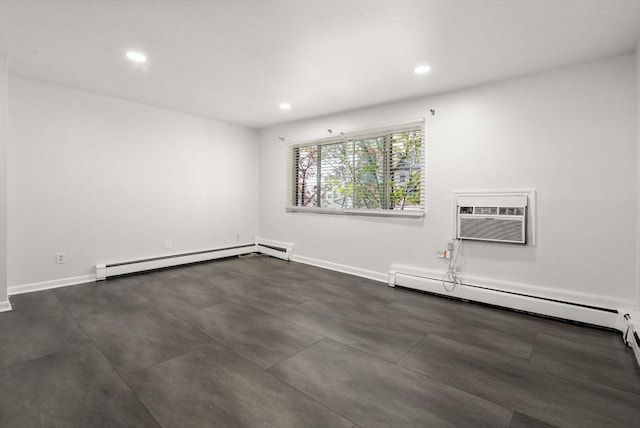 124 Addison St Unit 15, Chelsea, MA 02150 - spare room featuring an AC wall unit, recessed lighting, baseboard heating, and a baseboard radiator