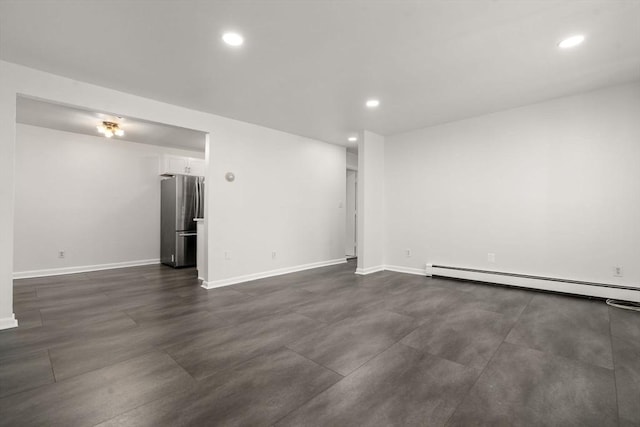 124 Addison St Unit 15, Chelsea, MA 02150 - unfurnished living room with baseboards, baseboard heating, and recessed lighting