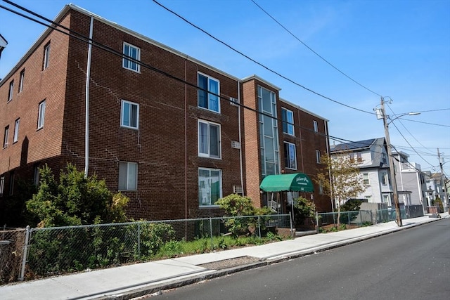 124 Addison St Unit 15, Chelsea, MA 02150 - view of property with fence