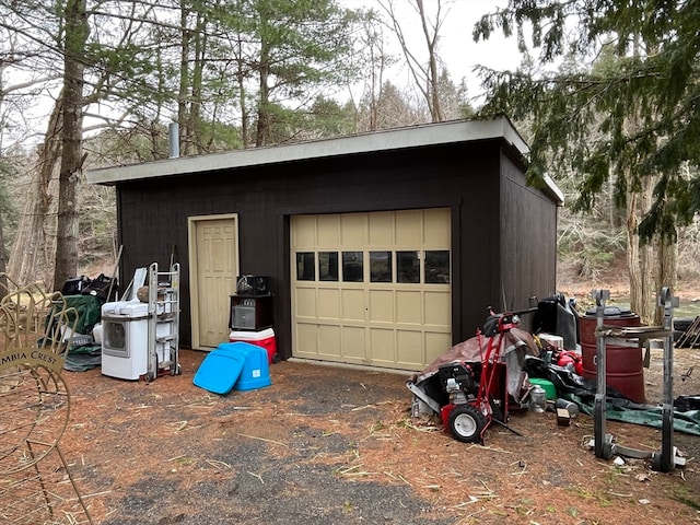 garage with wood walls