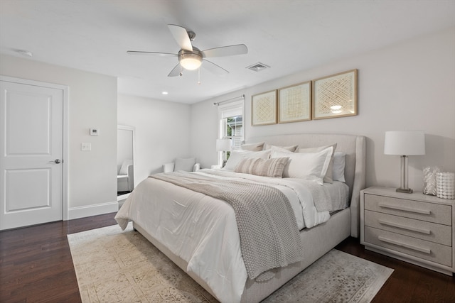 bedroom featuring dark hardwood / wood-style floors and ceiling fan