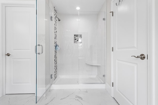 bathroom featuring walk in shower