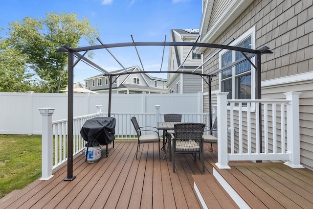 wooden deck featuring area for grilling