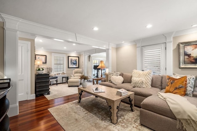 living room with recessed lighting, crown molding, and hardwood / wood-style flooring