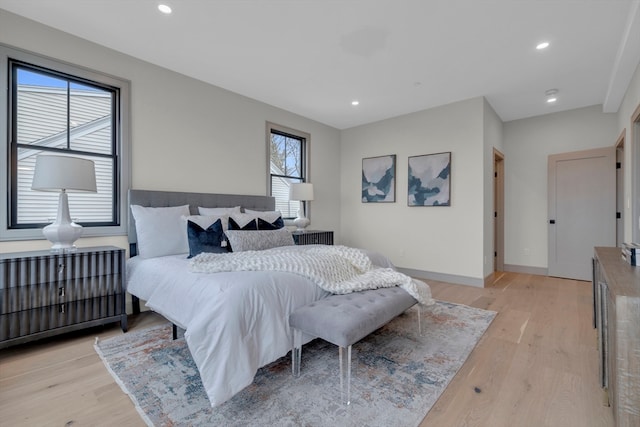 bedroom featuring light hardwood / wood-style floors