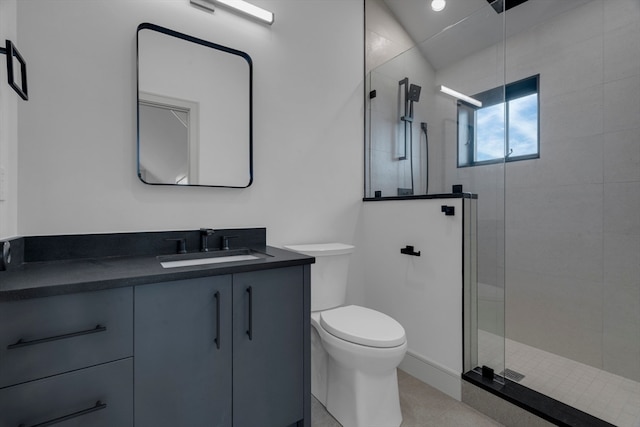 bathroom featuring vanity, toilet, an enclosed shower, and lofted ceiling