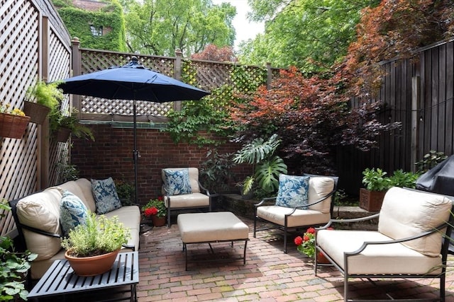 view of patio / terrace featuring a fenced backyard and outdoor lounge area