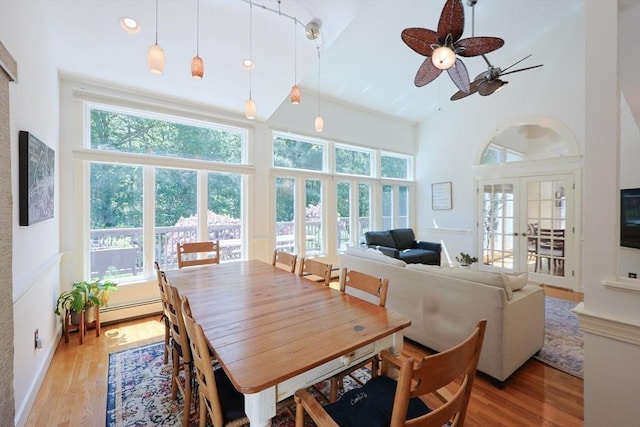 8 Mercer Ln, Franklin, MA 02038 - dining area with wood finished floors, healthy amount of natural light, a ceiling fan, and a towering ceiling
