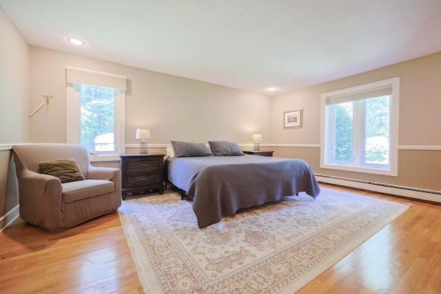 8 Mercer Ln, Franklin, MA 02038 - bedroom with a baseboard radiator, light wood-style floors, and recessed lighting