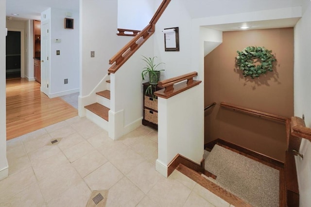 8 Mercer Ln, Franklin, MA 02038 - staircase with tile patterned floors and baseboards