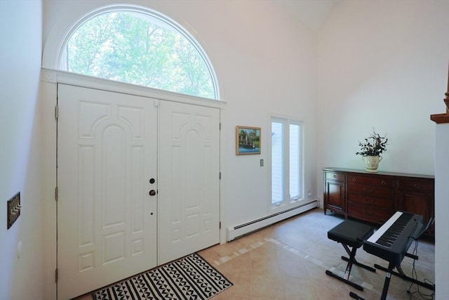 8 Mercer Ln, Franklin, MA 02038 - entryway featuring baseboard heating, plenty of natural light, vaulted ceiling, and light tile patterned floors
