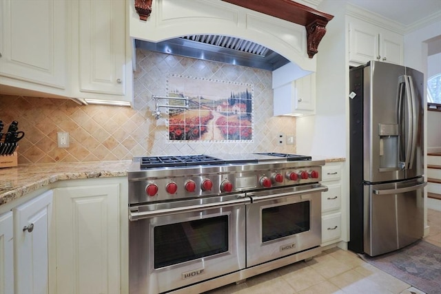 8 Mercer Ln, Franklin, MA 02038 - kitchen with stainless steel appliances, custom range hood, decorative backsplash, and light stone counters