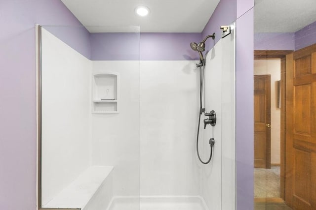 bathroom featuring walk in shower