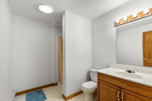 bathroom featuring vanity, toilet, and walk in shower